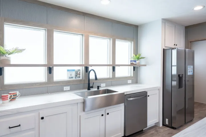 The BLUEBONNET BREEZE Kitchen. This Manufactured Mobile Home features 3 bedrooms and 2 baths.