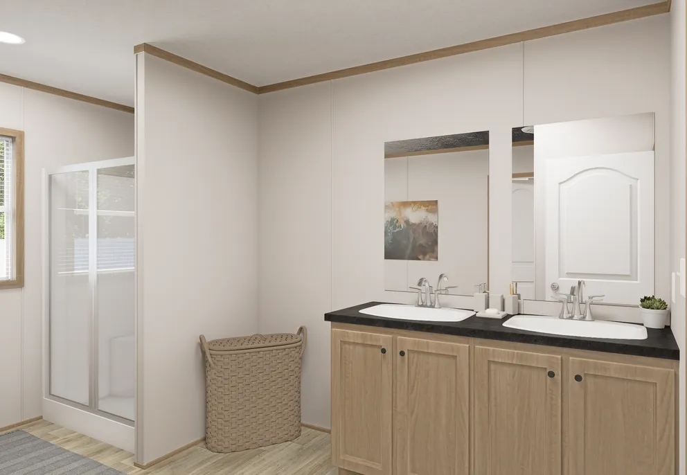 The THE MOUNTAINEER 72 Primary Bathroom. This Manufactured Mobile Home features 3 bedrooms and 2 baths.
