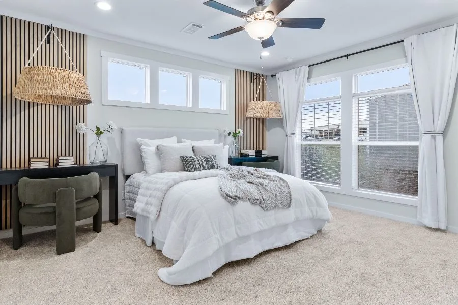 The THE ARCHIBALD Primary Bedroom. This Manufactured Mobile Home features 4 bedrooms and 2 baths.