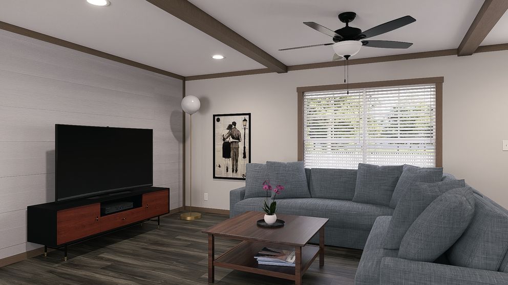 The EVERETT Living Room. This Manufactured Mobile Home features 4 bedrooms and 3 baths.