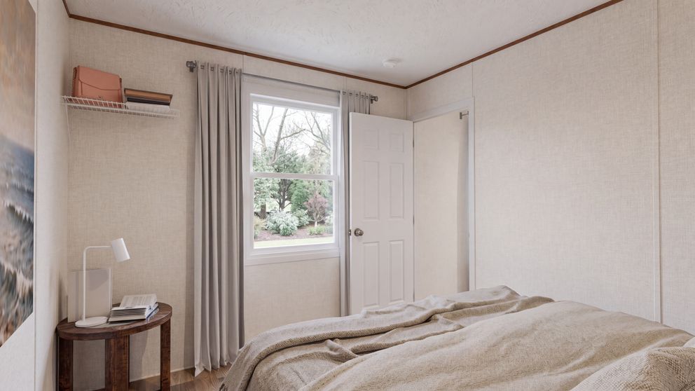 The TULIP Bedroom. This Manufactured Mobile Home features 2 bedrooms and 1 bath.