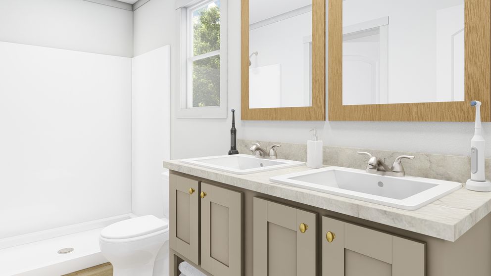 The RISING SUN Primary Bathroom. This Manufactured Mobile Home features 2 bedrooms and 2 baths.