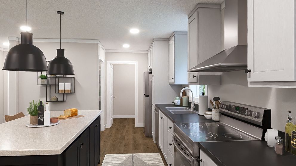 The WONDERFUL WORLD Kitchen. This Modular Home features 3 bedrooms and 2 baths.