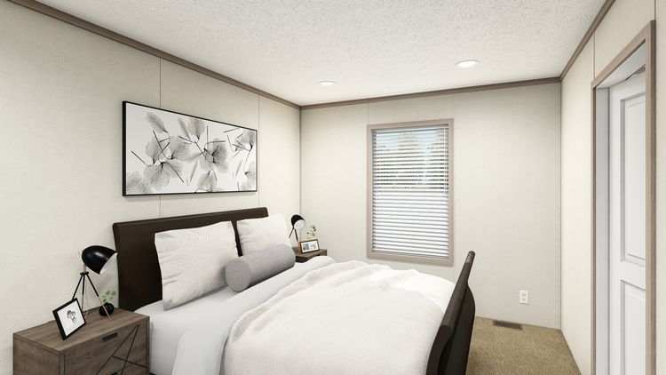 The 7616-4773P THE PULSE Primary Bedroom. This Manufactured Mobile Home features 3 bedrooms and 2 baths.