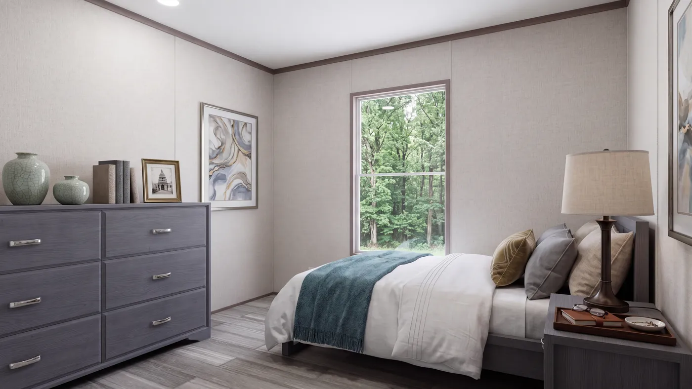 The THE MOUNTAINEER 60 Bedroom. This Manufactured Mobile Home features 3 bedrooms and 2 baths.