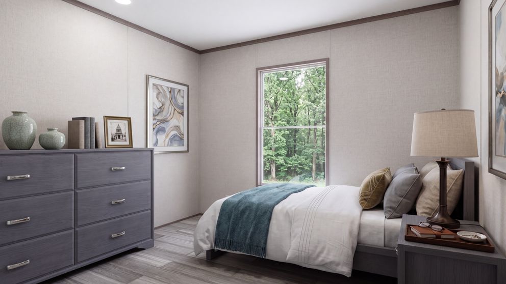The THE MOUNTAINEER 60 Bedroom. This Manufactured Mobile Home features 3 bedrooms and 2 baths.