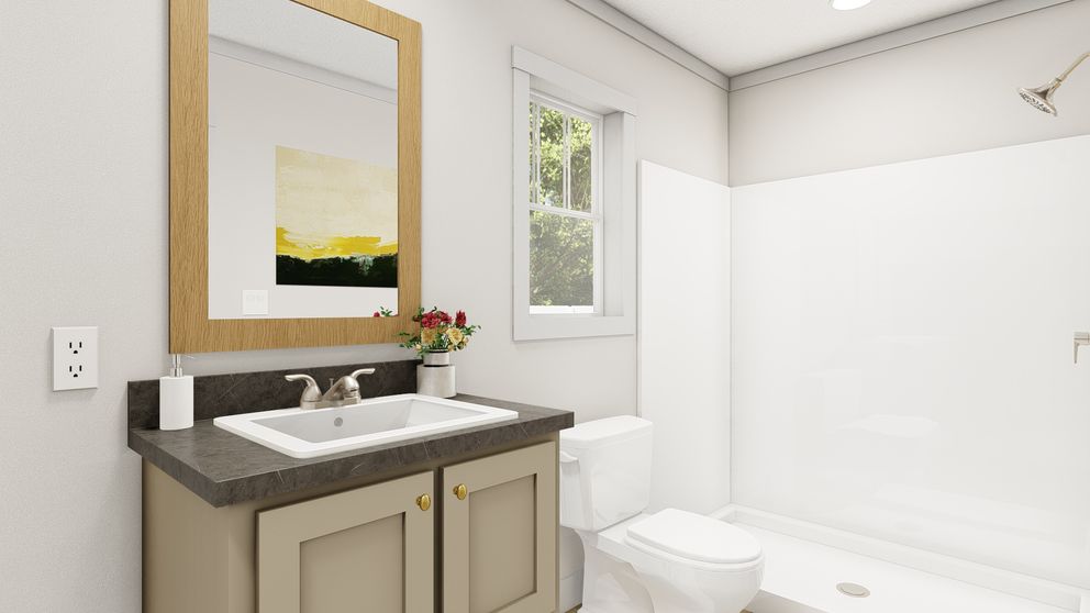 The WALK THE LINE Primary Bathroom. This Manufactured Mobile Home features 3 bedrooms and 2 baths.