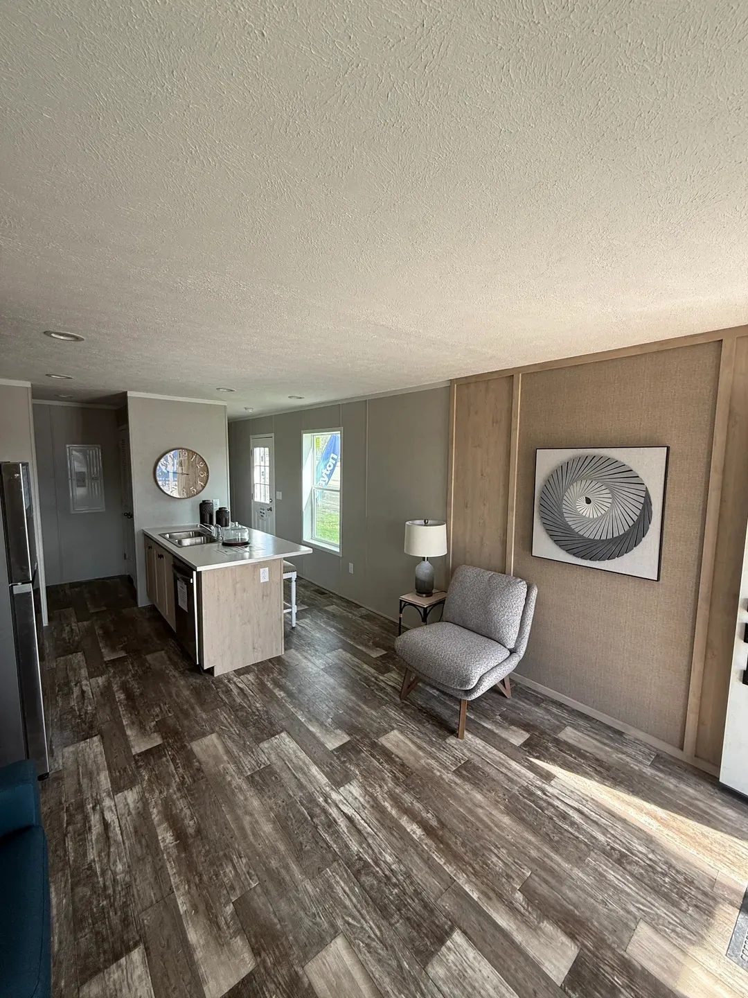 The ONYX Living Room. This Manufactured Mobile Home features 1 bedroom and 1 bath.