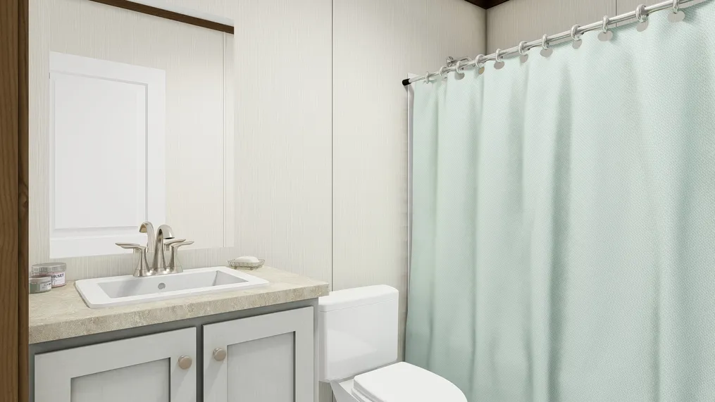 The COLOSSAL Guest Bathroom. This Manufactured Mobile Home features 3 bedrooms and 2 baths.