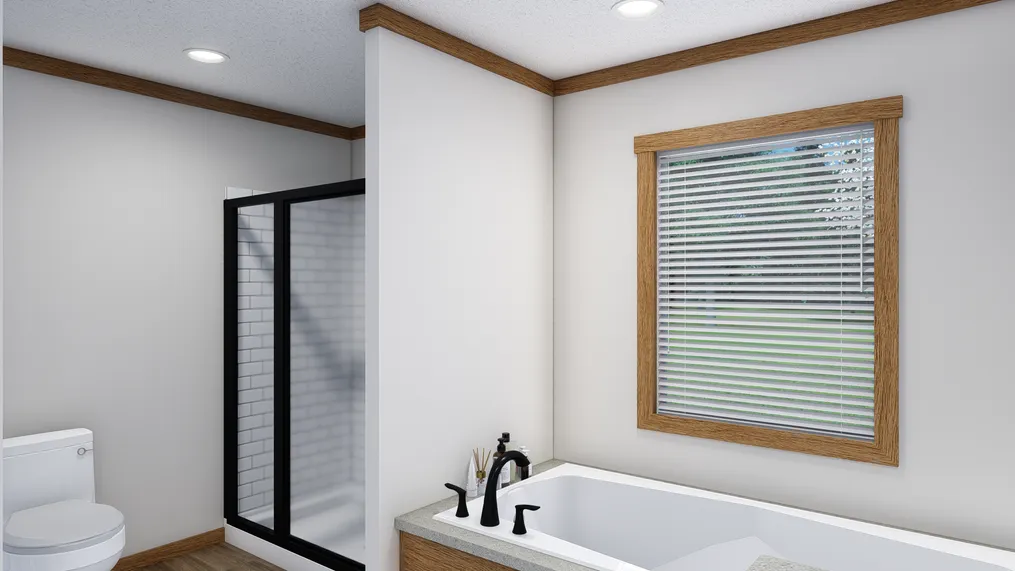 The LAYLA Primary Bathroom. This Manufactured Mobile Home features 4 bedrooms and 2 baths.