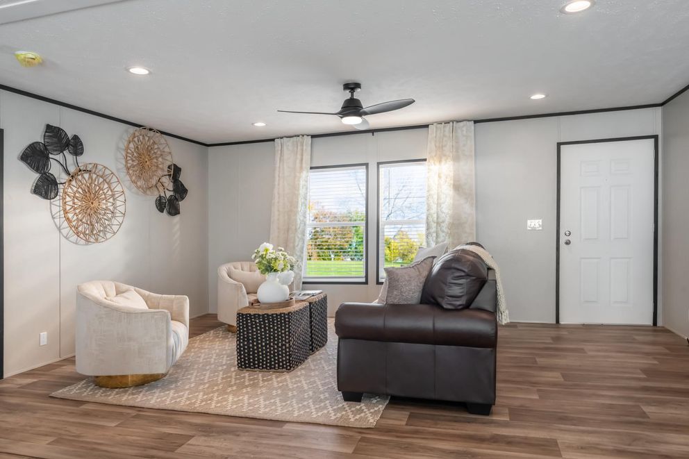 The ELEMENT Living Room. This Manufactured Mobile Home features 3 bedrooms and 2 baths.