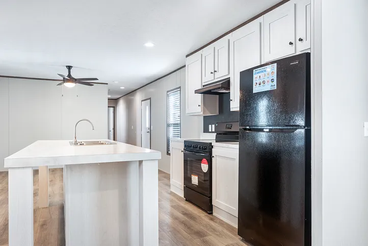 The SELECT 16723B Kitchen. This Manufactured Mobile Home features 3 bedrooms and 2 baths.