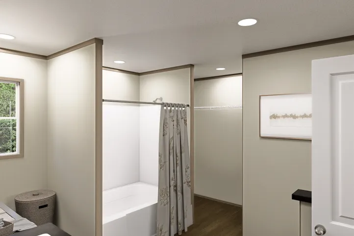 The RAINIER Primary Bathroom. This Manufactured Mobile Home features 4 bedrooms and 3 baths.