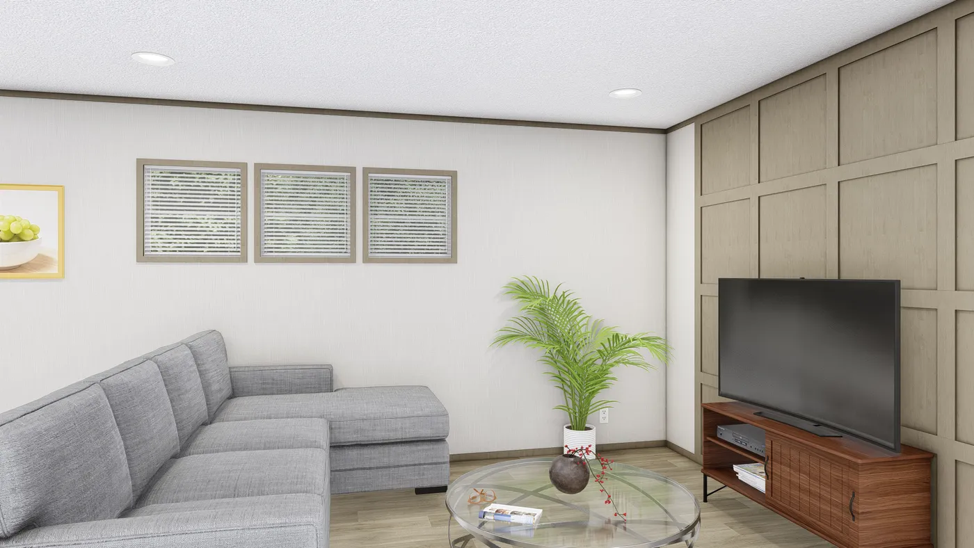 The MAGELLAN Living Room. This Manufactured Mobile Home features 3 bedrooms and 2 baths.