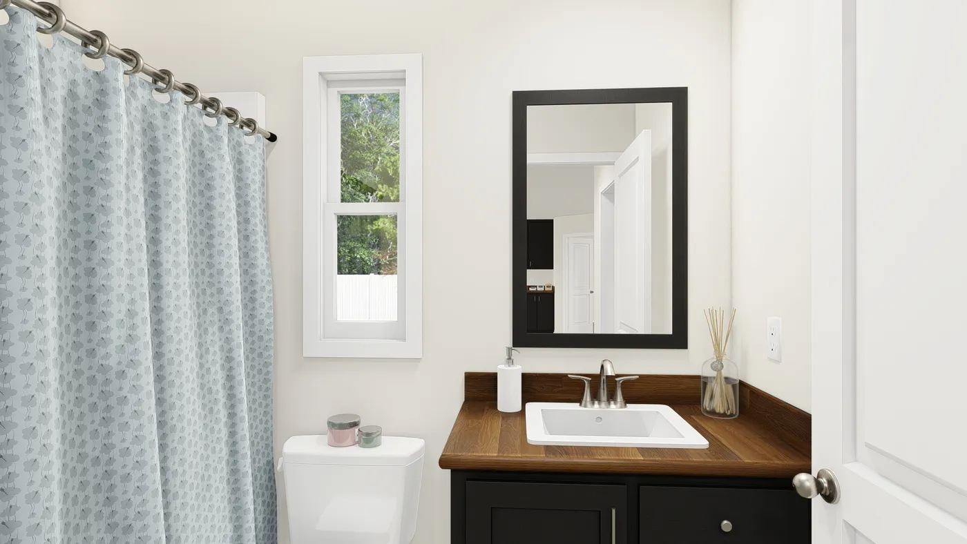 The DRM483F 48'              DREAM Guest Bathroom. This Manufactured Mobile Home features 3 bedrooms and 2 baths.