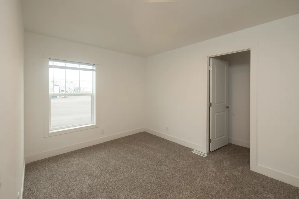 The HEY JUDE Bedroom. This Manufactured Mobile Home features 4 bedrooms and 2 baths.