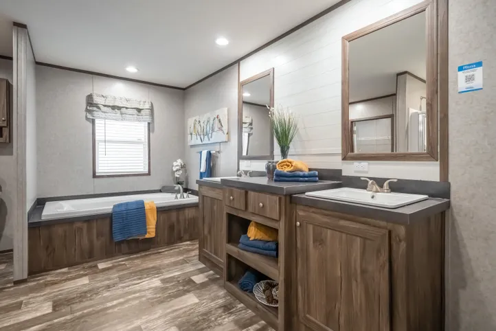 The LOCKLEAR Exterior. This Manufactured Mobile Home features 4 bedrooms and 2 baths.