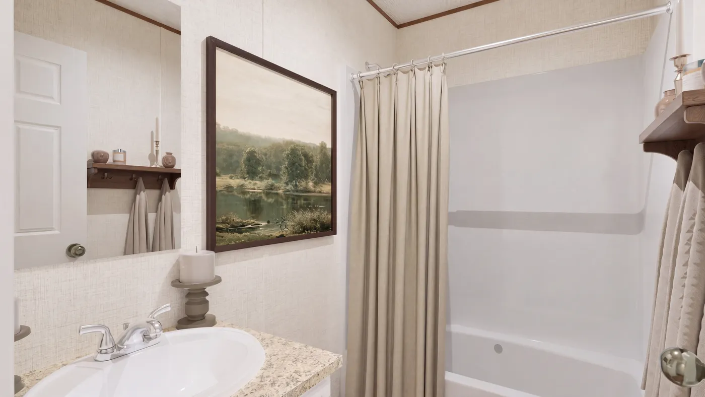 The TULIP Primary Bathroom. This Manufactured Mobile Home features 2 bedrooms and 1 bath.
