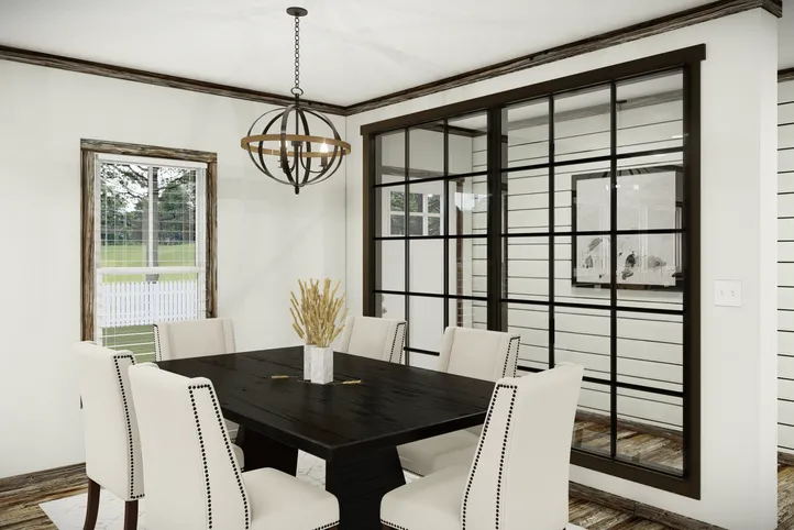 The THE SUMNER Dining Area. This Manufactured Mobile Home features 3 bedrooms and 2 baths.