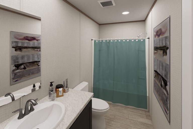 The ULTRA FLEX JEWEL Guest Bathroom. This Manufactured Mobile Home features 3 bedrooms and 2 baths.