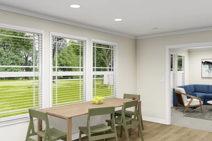 The RENEGADE 48A Dining Area. This Manufactured Mobile Home features 3 bedrooms and 2 baths.