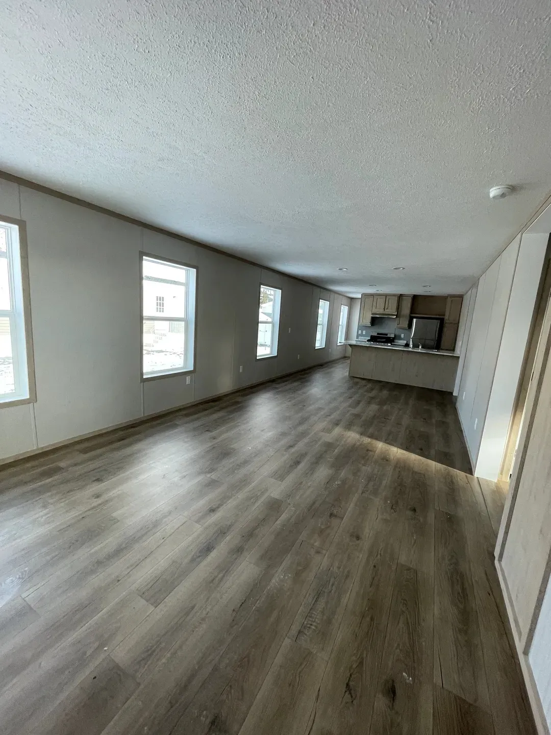 The JADE 48 Living Room. This Manufactured Mobile Home features 3 bedrooms and 2 baths.