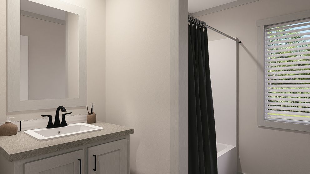 The FARM 3 FLEX DEN Guest Bathroom. This Manufactured Mobile Home features 3 bedrooms and 2 baths.
