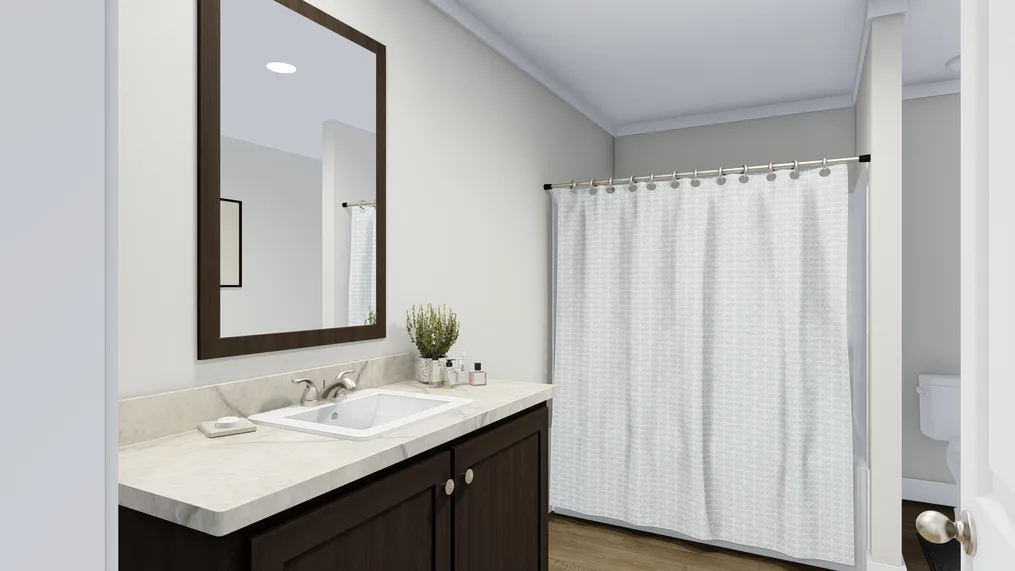 The SANTA FE 684A Primary Bathroom. This Manufactured Mobile Home features 4 bedrooms and 2 baths.