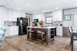 The THE SUNDOWNER Kitchen. This Manufactured Mobile Home features 3 bedrooms and 2 baths.