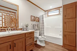 The THE DURANGO Guest Bathroom. This Manufactured Mobile Home features 3 bedrooms and 2 baths.