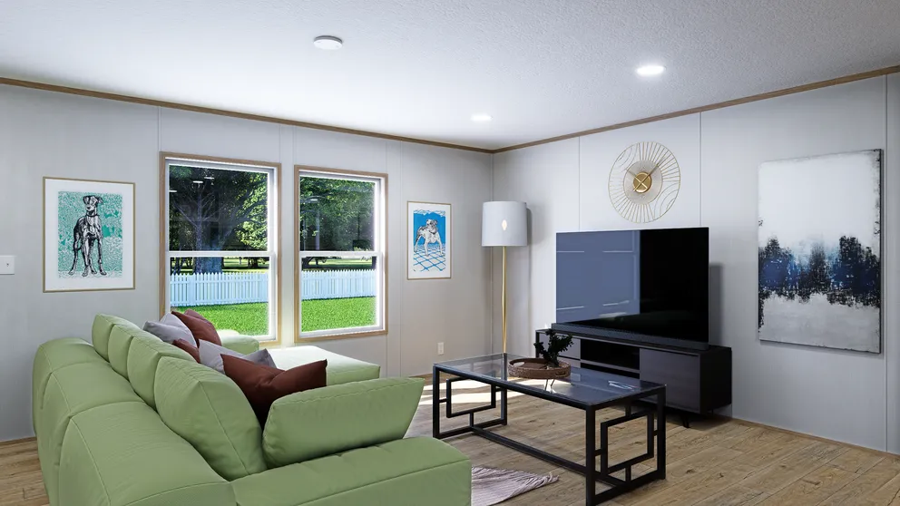 The SOLACE Living Room. This Manufactured Mobile Home features 4 bedrooms and 2 baths.