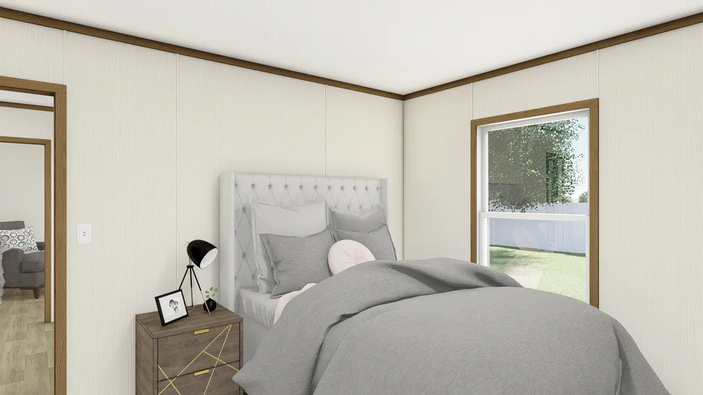 The THE OCCASION Guest Bedroom. This Manufactured Mobile Home features 4 bedrooms and 2 baths.