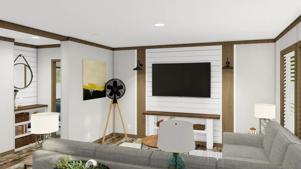 The HOMESTEAD BREEZE Living Room. This Manufactured Mobile Home features 4 bedrooms and 2 baths.