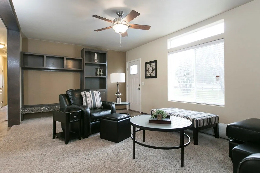 The 2023 COLUMBIA RIVER (NEW) Living Room. This Manufactured Mobile Home features 3 bedrooms and 2 baths.