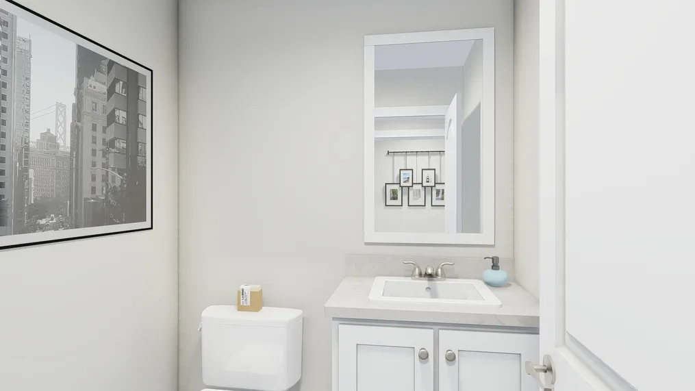 The COUNTRY AIRE Guest Bathroom. This Manufactured Mobile Home features 3 bedrooms and 3 baths.