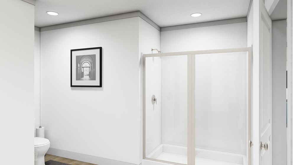 The WONDERFUL WORLD Primary Bathroom. This Manufactured Mobile Home features 3 bedrooms and 2 baths.