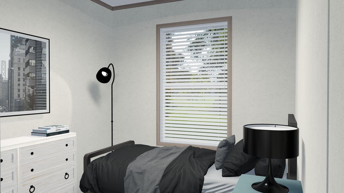 The 6616-4779 THE PULSE Guest Bedroom. This Manufactured Mobile Home features 3 bedrooms and 2 baths.