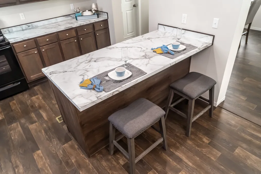 The MAVERICK 56A Kitchen. This Manufactured Mobile Home features 3 bedrooms and 2 baths.