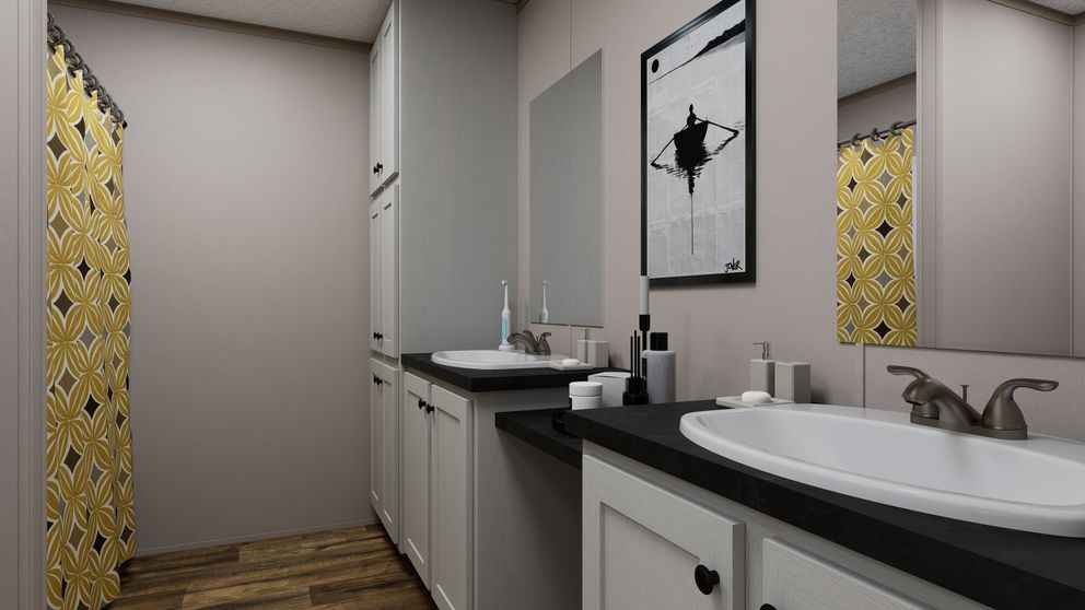 The MOUNTAIN BREEZE 3260 Guest Bathroom. This Manufactured Mobile Home features 3 bedrooms and 2 baths.