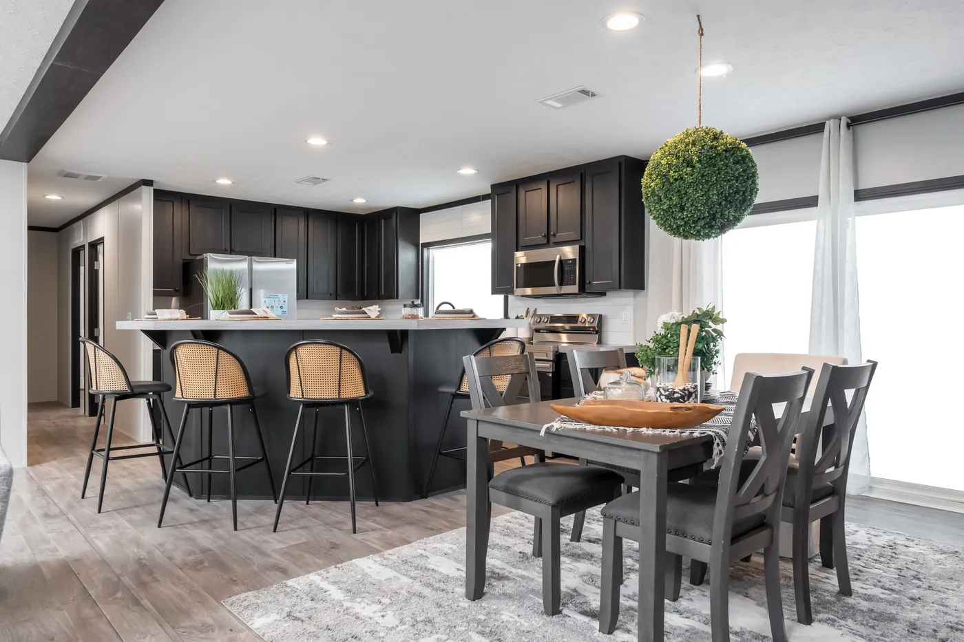 The CRAZY EIGHTS Dining Area. This Manufactured Mobile Home features 4 bedrooms and 2 baths.