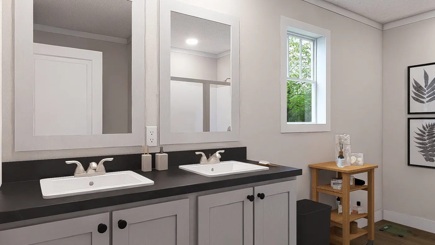 The HEY JUDE Primary Bathroom. This Manufactured Mobile Home features 4 bedrooms and 2 baths.