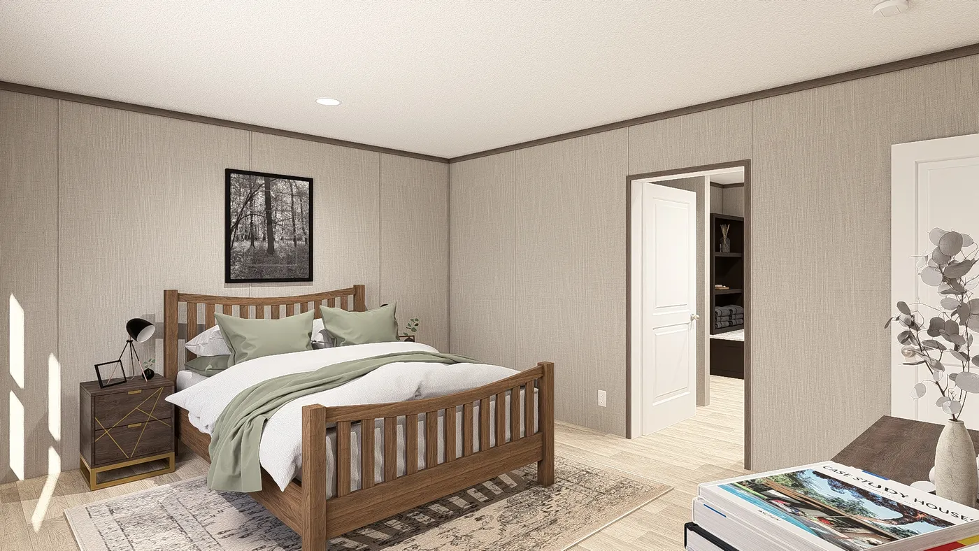 The ULTRA PRO 3 BR 28X60 Primary Bedroom. This Manufactured Mobile Home features 3 bedrooms and 2 baths.