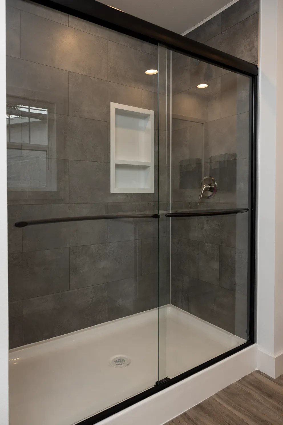 The HEY JUDE Primary Bathroom. This Manufactured Mobile Home features 4 bedrooms and 2 baths.