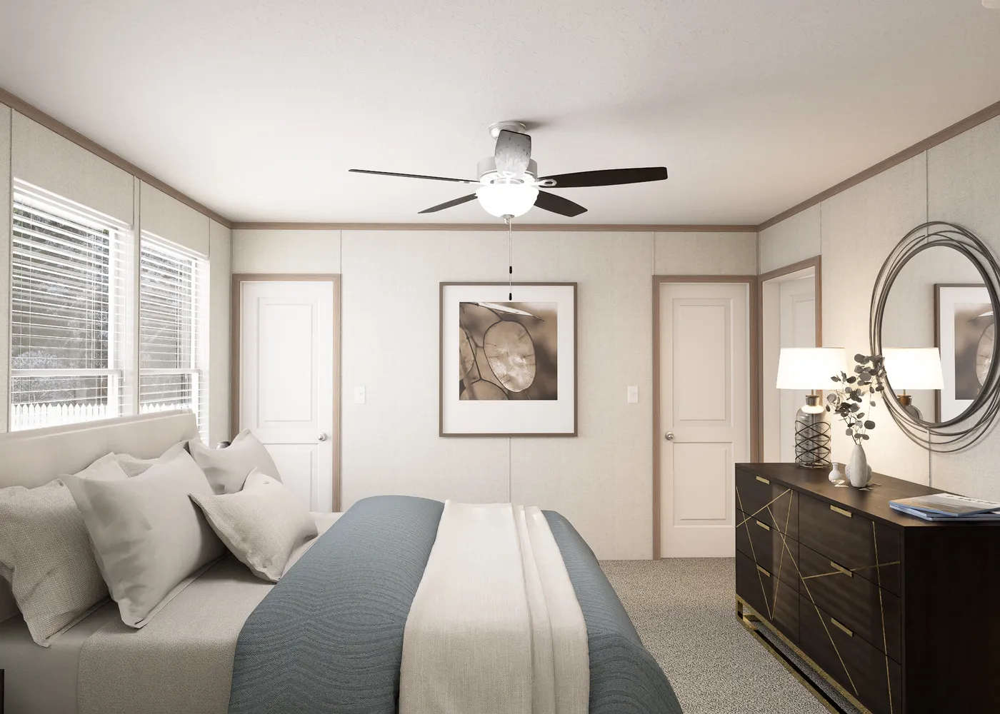 The THE RESERVE 60 Primary Bedroom. This Manufactured Mobile Home features 3 bedrooms and 2 baths.