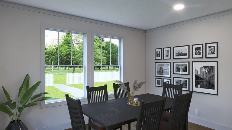 The JOHNNY B GOODE Dining Area. This Manufactured Mobile Home features 3 bedrooms and 2 baths.