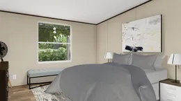 The TRIUMPH Bedroom. This Manufactured Mobile Home features 5 bedrooms and 3 baths.