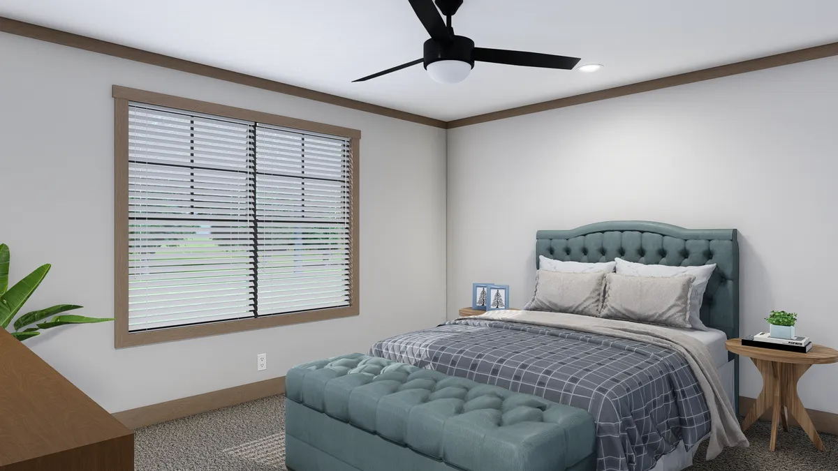 The WILDER Primary Bedroom. This Manufactured Mobile Home features 3 bedrooms and 2 baths.