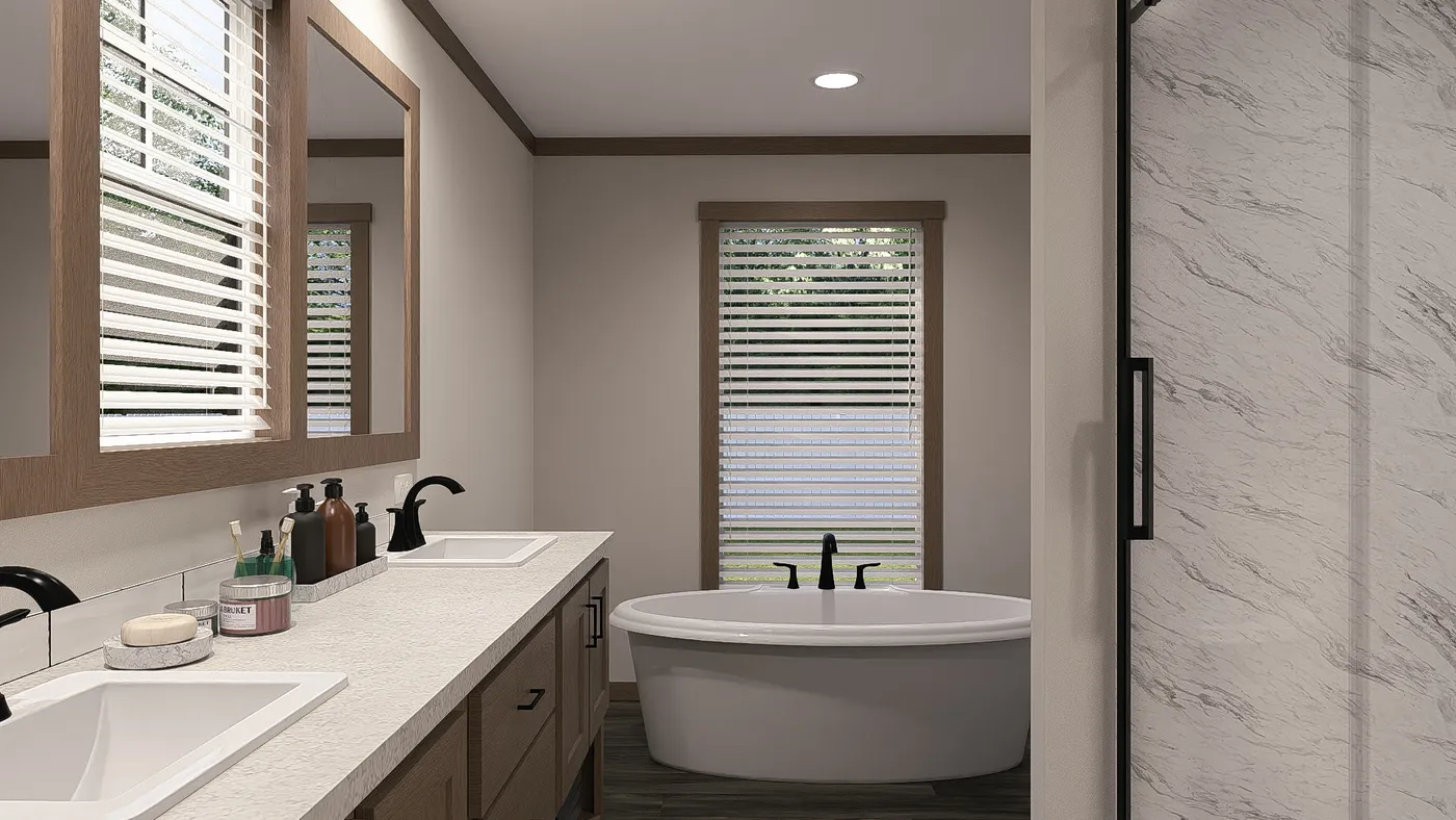 The TINSLEY Primary Bathroom. This Manufactured Mobile Home features 4 bedrooms and 2 baths.