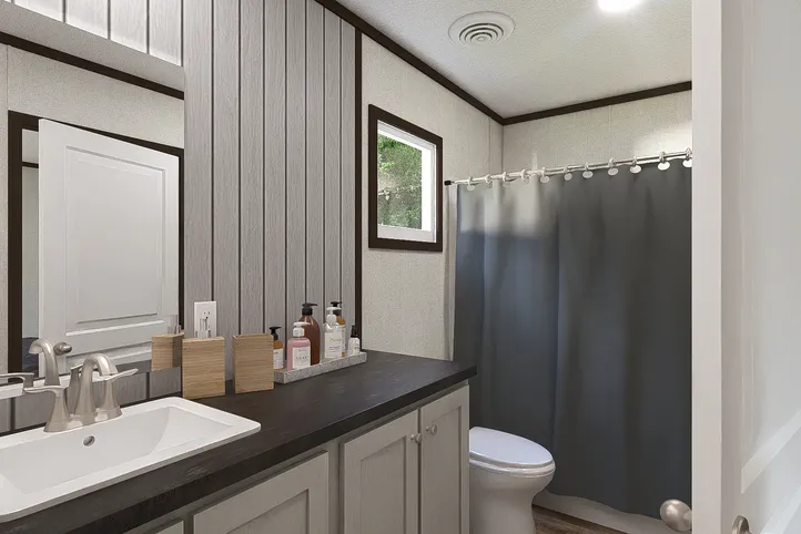 The SPIRIT Primary Bathroom. This Manufactured Mobile Home features 2 bedrooms and 2 baths.