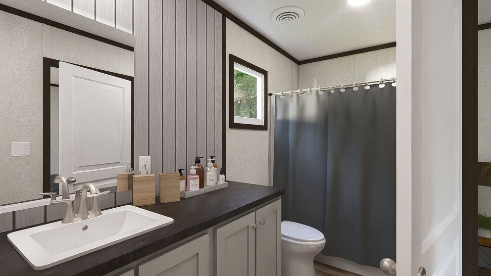 The SPIRIT Primary Bathroom. This Manufactured Mobile Home features 2 bedrooms and 2 baths.